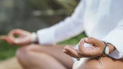 Close-up of hands in murda of woman meditating and balancing energy. — Stock Photo