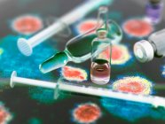 Investigación farmacéutica. Potenciales nuevos medicamentos y vacunas en micrografía electrónica del virus - foto de stock