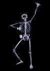 Person dancing with glow stick, X-ray. — Stock Photo