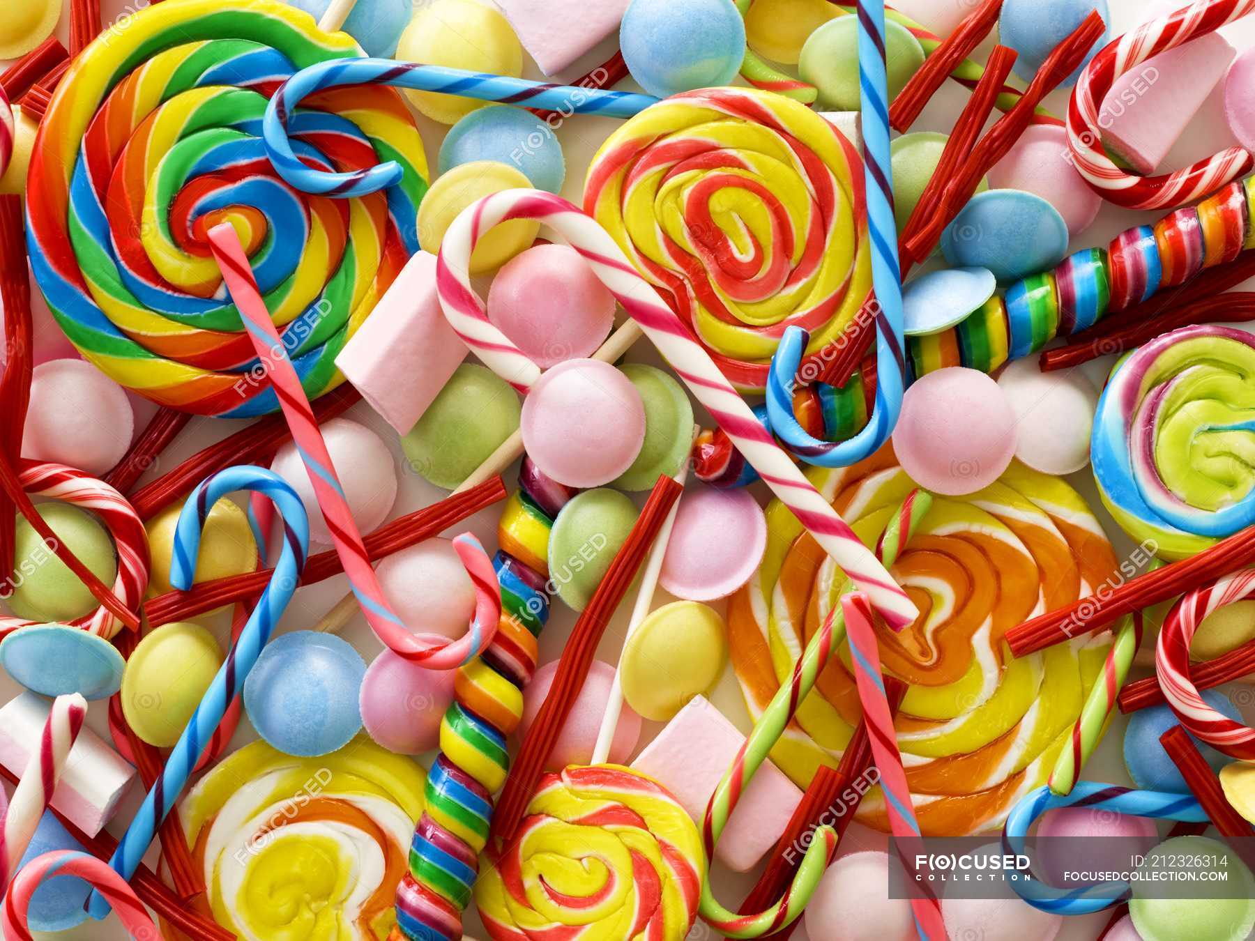 Isolator telescoop Mooie jurk Colorful sweets and candy canes, full frame. — arrangement, abundance -  Stock Photo | #212326314