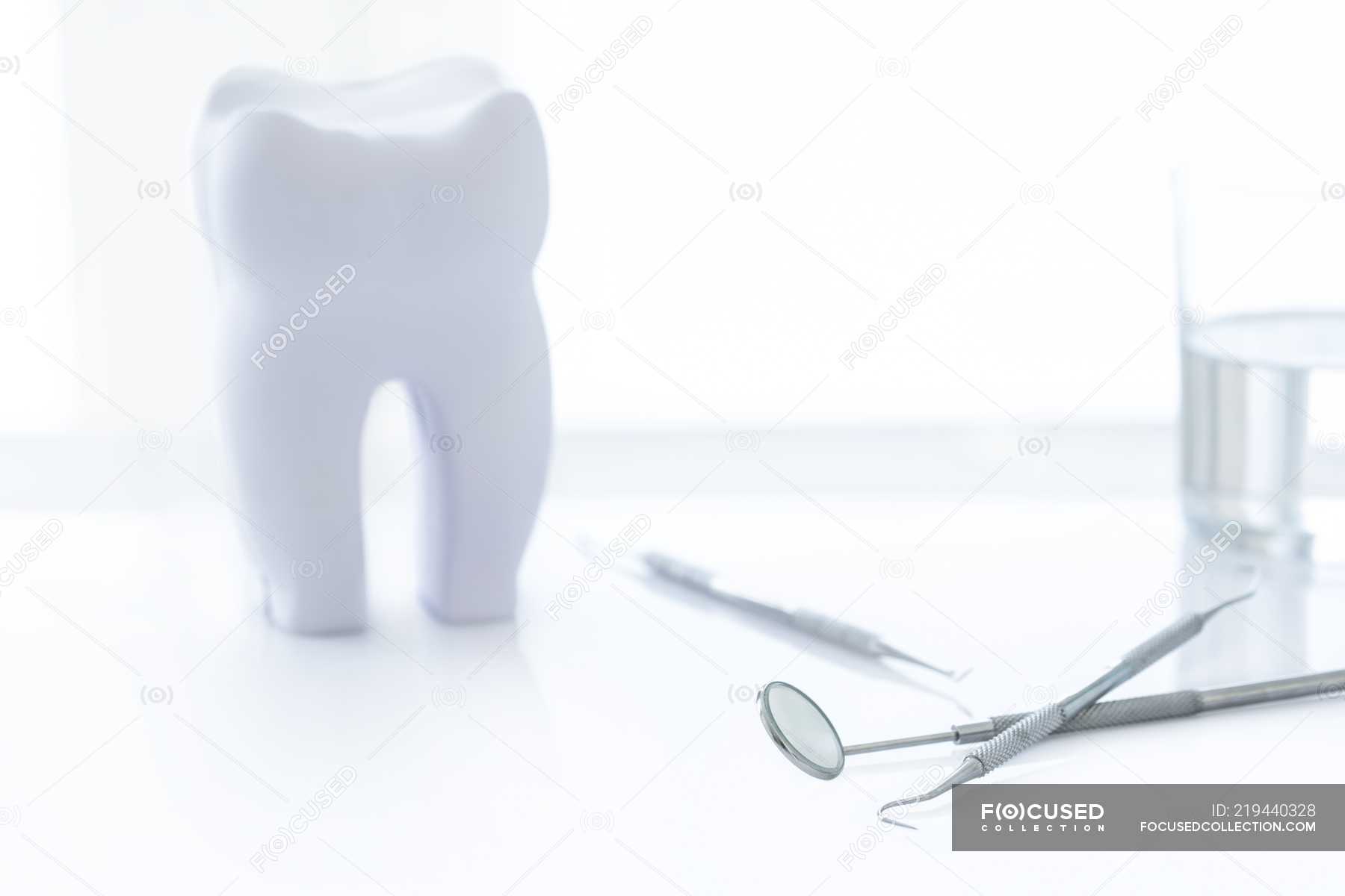 Dental clinic equipment and tools against white background. — treatment,  hygiene - Stock Photo | #219440328