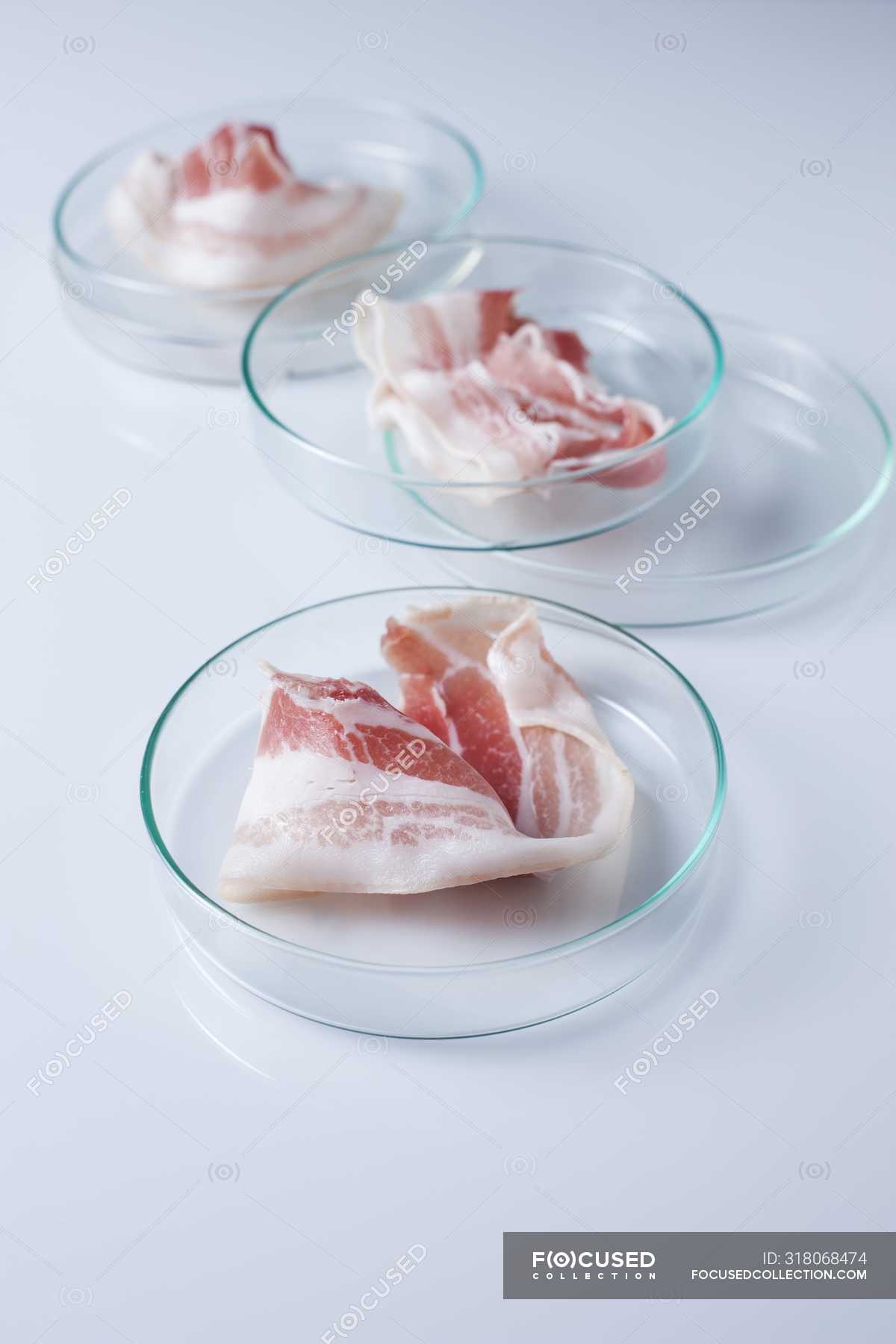 Conceptual image of cultured meat grown in laboratory glassware