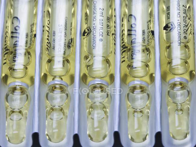 Ampoules of collagen skin care products. — Stock Photo