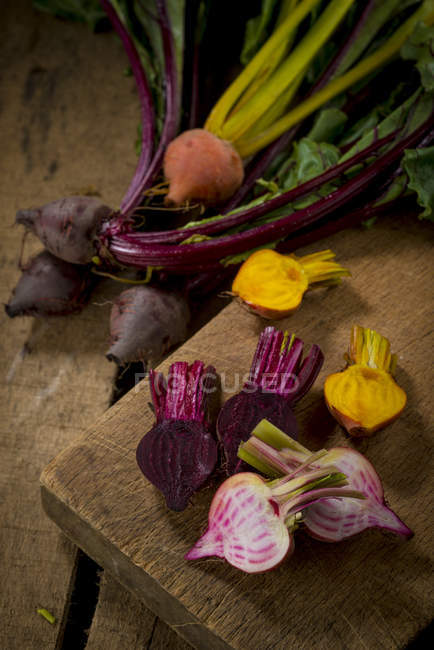 Sliced beetroots on wooden table. — Stock Photo