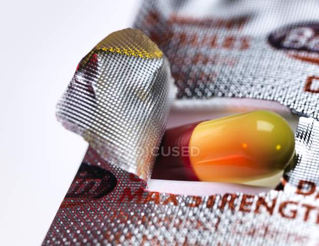 Close-up of flu remedy in foil pack. — Stock Photo