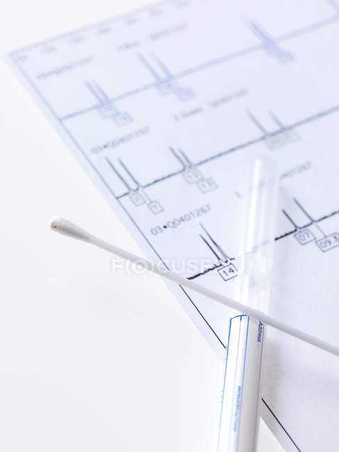 DNA swab on genetic test results. — Stock Photo