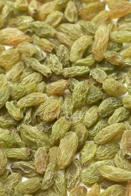 Close-up view of green raisins. — Stock Photo