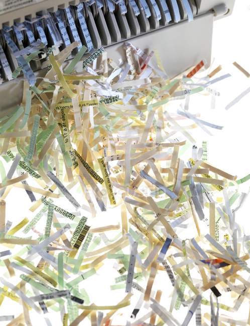 Shredded paper after passing through shredder. — Stock Photo