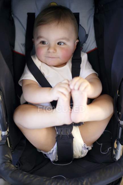 Baby Boy Strapped Into Car Safety Seat, Strapped In Car Seat Safety