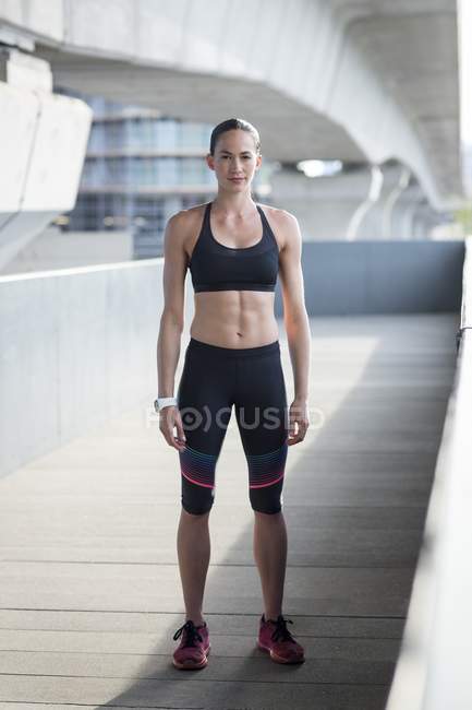 Young woman in sports wear — Stock Photo