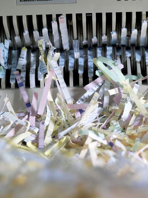 Shredded paper after passing through shredder. — Stock Photo