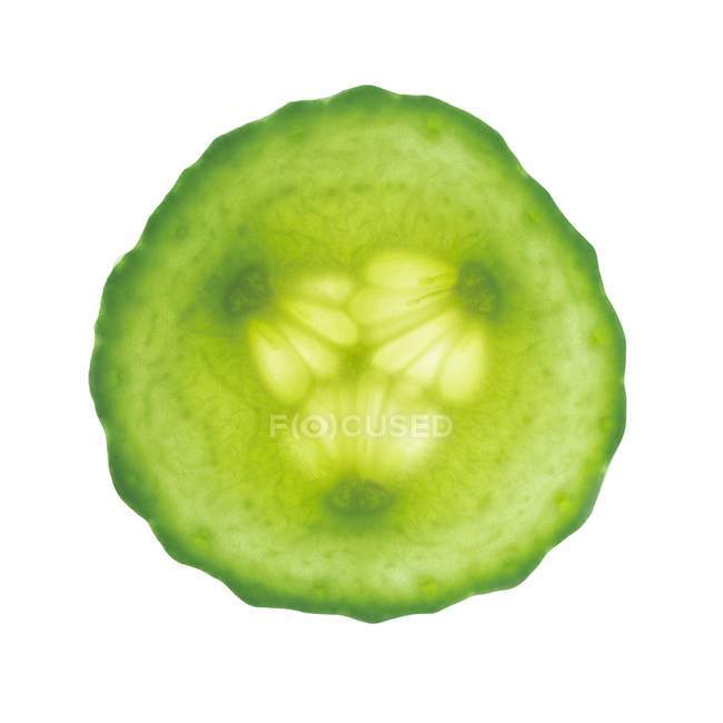 Close-up view of cucumber slice on white background. — Stock Photo