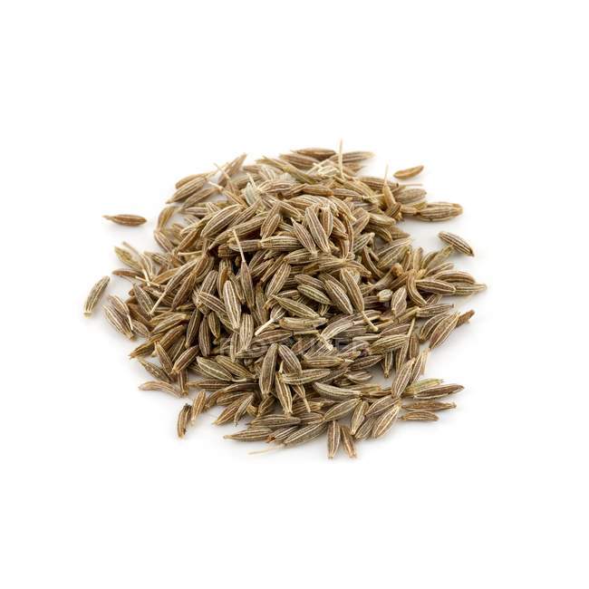Cumin seeds on white background. — Stock Photo