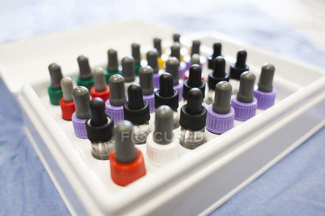 Pipette bottles in tray with allergens. — Stock Photo