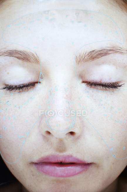 Face of woman undergoing examination in skin clinic. — Stock Photo
