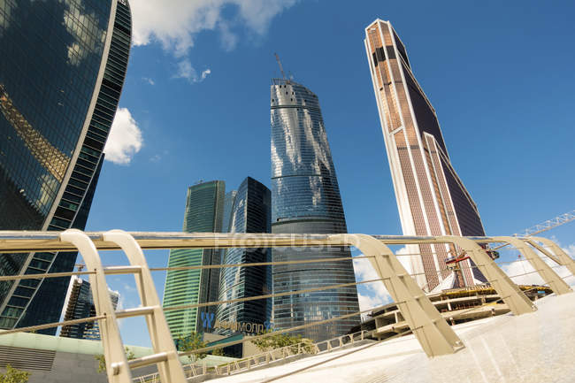 MOSCOW, RUSSIA - CIRCA AUGUST, 2015: Low angle view of Mercury Tower and skyscrapers. — Stock Photo