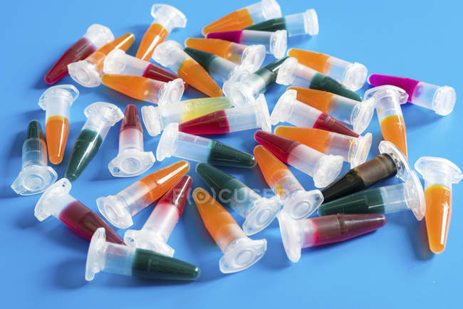 Close-up of microcentrifuge tubes with various samples. — Stock Photo