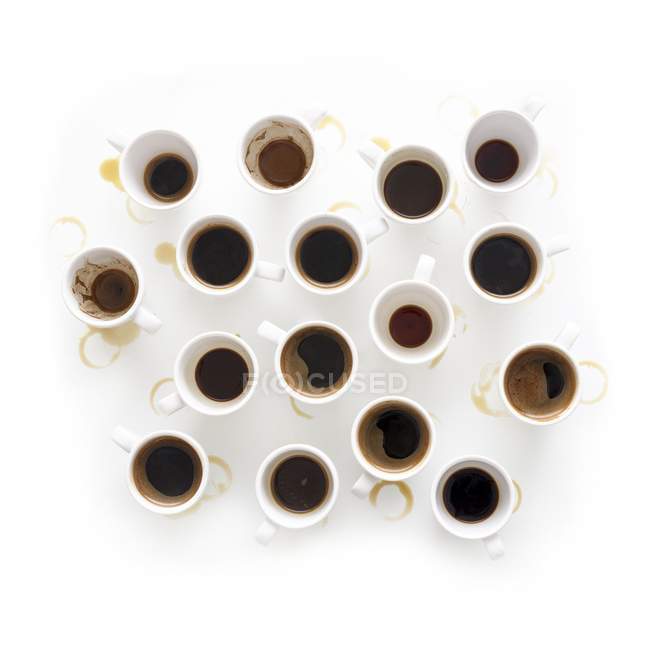 Cups of black aromatic coffee, top view. — Stock Photo