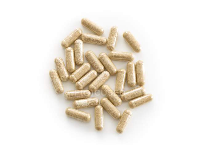 Suppléments de perte de poids en capsules sur fond blanc . — Photo de stock