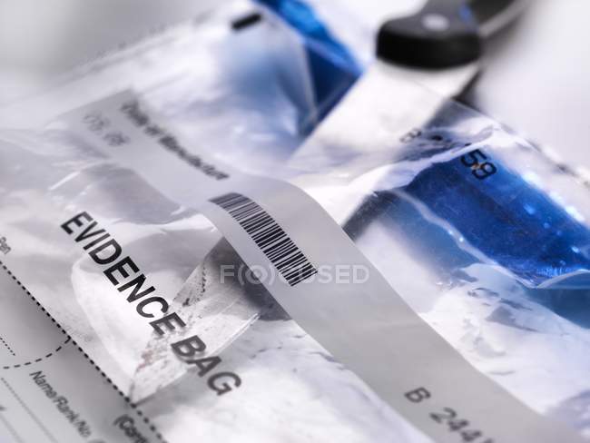 Forensic evidence collection with knife for DNA forensic test. — Stock Photo