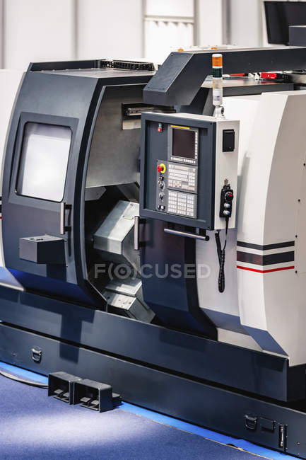 CNC machine in modern industrial facility. — Stock Photo