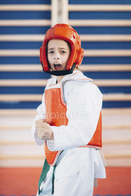 Girl in taekwondo class. — Stock Photo