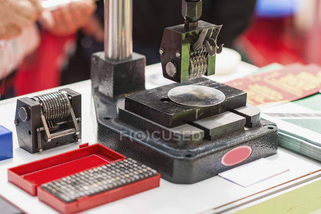 Serial number marking machine in modern industrial facility. — Stock Photo