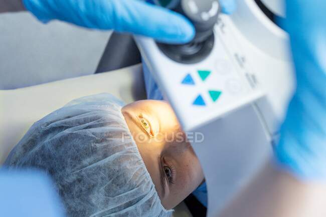 Patient undergoing laser eye surgery. — Stock Photo