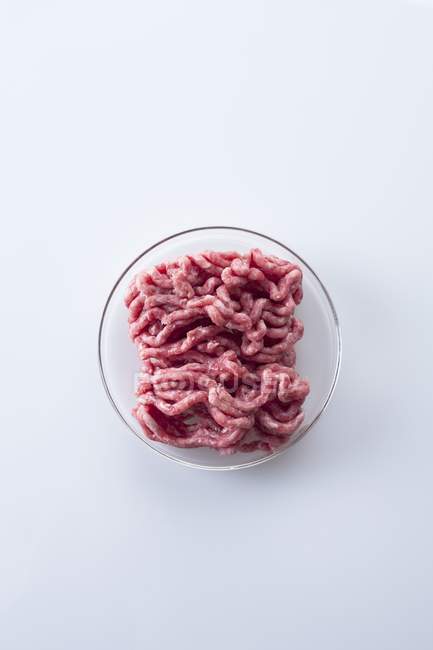 Conceptual image of fake meat in petri dish grown in laboratory. — Stock Photo