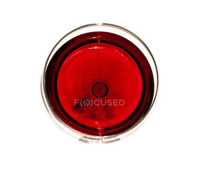 Overhead view of glass of red wine. — Stock Photo