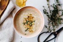 Parsnip soup with herbs — Stock Photo
