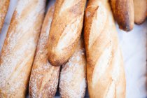 Fresh baguettes at bakery — Stock Photo