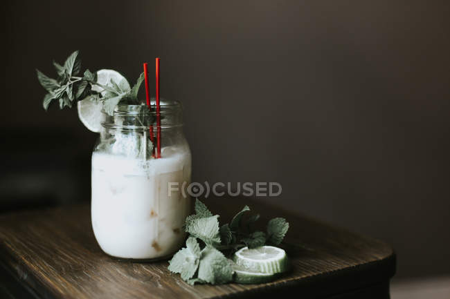 Milk herb drink in jar — Stock Photo