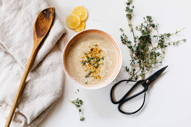 Parsnip soup with herbs — Stock Photo
