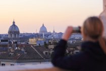 Girl taking photo of Rome — Stock Photo