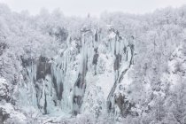 Frozen mountain slope covered with snow — Stock Photo