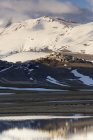 Castelluccio di Norcia, the old village destroyed by the earthquake of 2016 with Vettore montain in background — Stock Photo