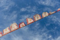 Prayer flags on rope — Stock Photo