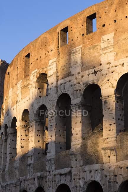 Walls of Colosseum at sunset — Stock Photo