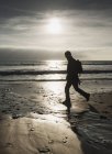 Silhouette of man walking — Stock Photo