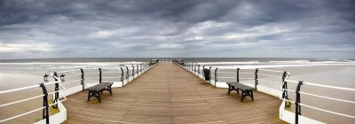 Dock With Benches against cloudy sky — Stock Photo