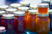 Jars Of Preserves with caps — Stock Photo