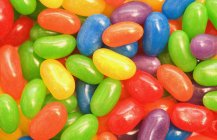 Closeup tasty colorful jelly beans heap — Stock Photo