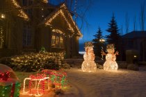 Casa con luci di Natale — Foto stock