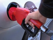 Gas Nozzle In Car — Stock Photo