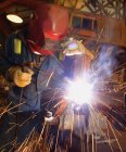 Welder oh work with welding machine — Stock Photo