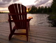 Adirondack Chair on pier — Stock Photo