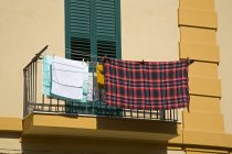 Balcony with hanging cloth — Stock Photo