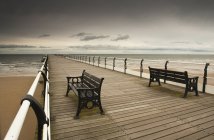 Wooden Pier With Benches — Stock Photo