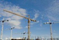Cranes working during daytime — Stock Photo